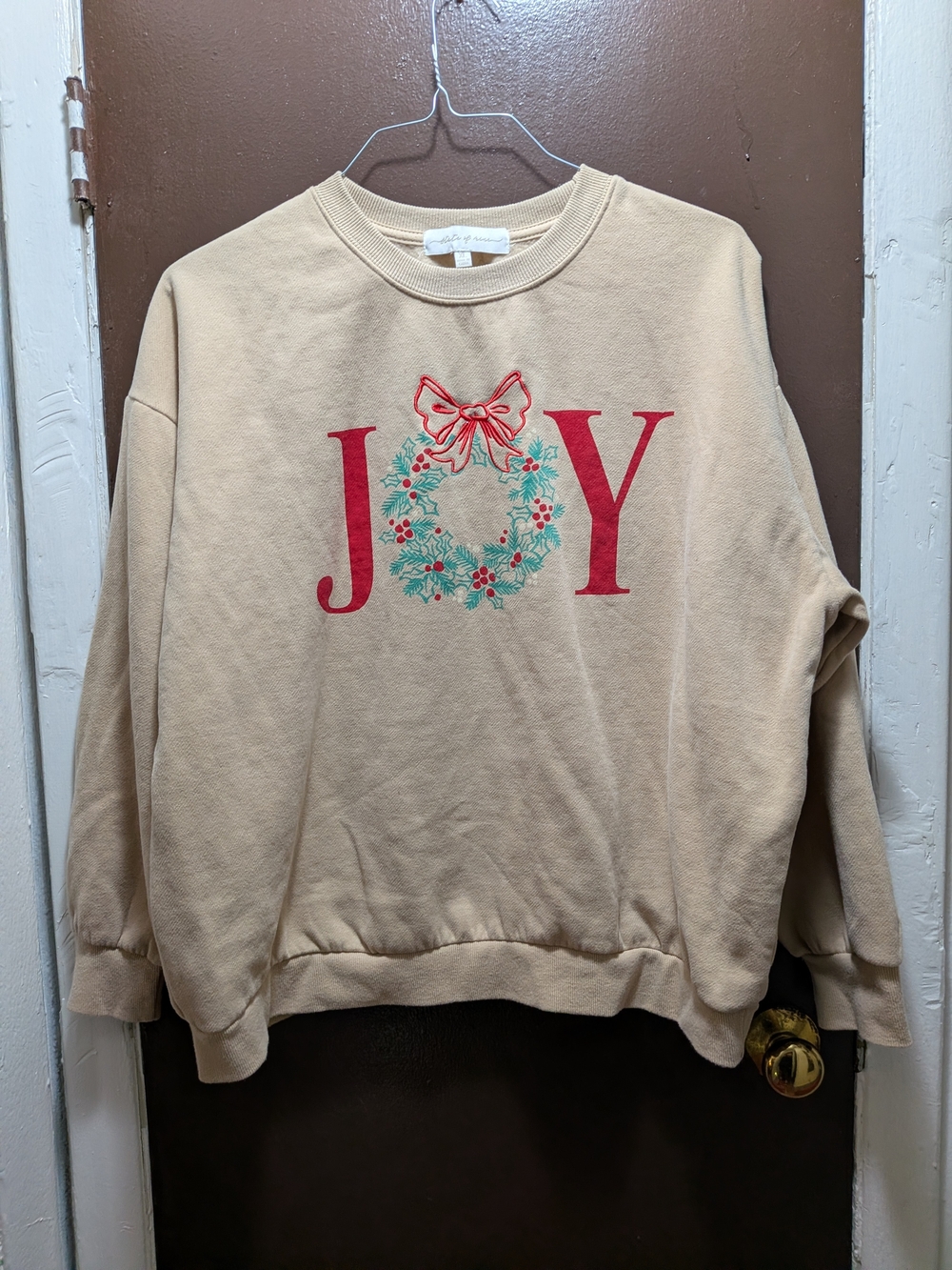 State of Mind Beige Crewneck Sweatshirt with Red Holiday "JOY" Graphic